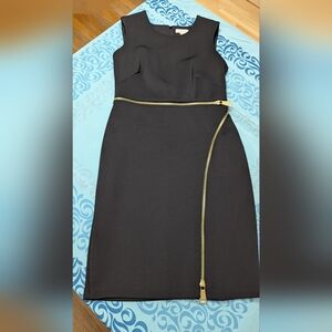 Women's Calvin Klein Black cocktail dress with gold zipper accents. Size 10